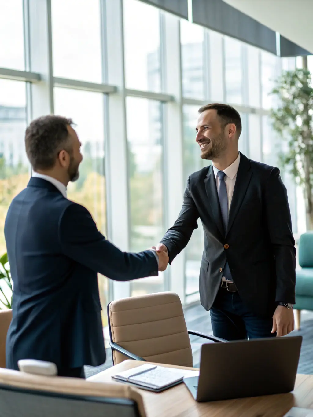 A satisfied client shaking hands with a D.I.B Logistics LLC representative, symbolizing the company's commitment to client satisfaction and long-term partnerships.
